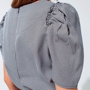 Elegant Black and White Checkered Blouse